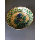 Japanese bowl decorated with peony on a green/yellow background, 23cm diam