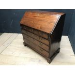 George III mahogany bureau with fall front, fitted interior over 4 long graduated drawers with brass