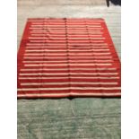 Contemporary rug with modern design of red and fawn horizontal designs 217 x 187 cm