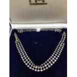 14 carat white gold diamond necklace in the Art Deco style