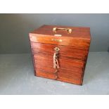 C19th mahogany dentist's travelling cabinet with opening lid & 6 fitted drawers, made by the