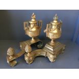 Pair of lacquered brass Chenets, as a twin handled vase with flame & pine cone finials