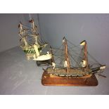 Chinese carved ivory fishing boat on hardwood stand 7cm; carved wooden 3 mast clipper on base 17cm &