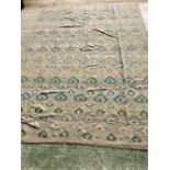 Contemporary rug with all over modern motifs, soft blue ground with fawns and grey motifs 338 x
