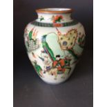 Late C19th Chinese famille verte ovoid vase decorated with equestrian figures amidst a landscape