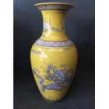 Early C20th Chinese yellow ground baluster vase decorated with 5 claw dragon amidst clouds, 6