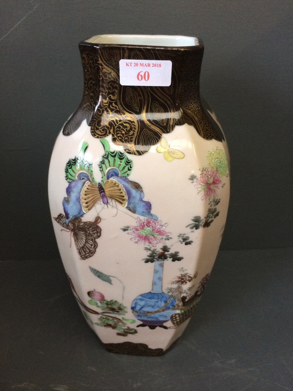 Oriental cream ground vase polychrome enamelled with butterflies, foliage & scholarly emblems