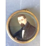 Portrait miniature of a 'Gentleman', head and shoulders, circular in a gilt frame