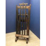 Vintage stained pine artist's easel with winding mechanism, approx. 200cmH