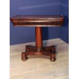 Early C19th rosewood card table with turned pedestal on shaped supports, 88cmW