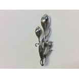 Silver flower shaped brooch