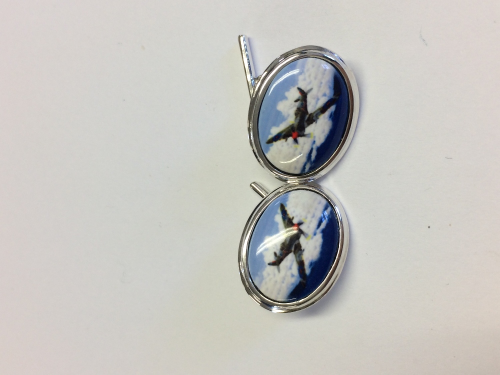 Pair of silver and enamel cufflinks depicting a Spitfire