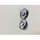 Pair of silver and enamel cufflinks depicting a Spitfire