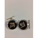 Pair of silver and enamel cufflinks with Masonic symbol