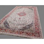 Pure silk oriental rug with cream ground and red and blue borders 1.90 x 1.22m