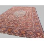 c.1920 oriental carpet with all over geometric pattern and border in red, blue and orange 2.92 x 2