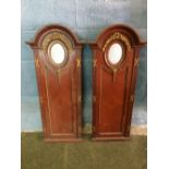 Pair of walnut, parcel gilt dome top panels, each inset with a blue jasperware plaque, 96cmH