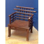 Chinese hardwood "throne" style armchair with turned and carved rails on block legs