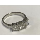 18 carat three stone, princess cut, diamond ring of 1.42 carats