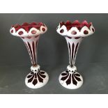 Pair of Bohemian cranberry white overlaid table lustre's (both missing drops)