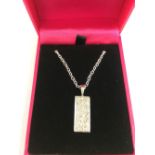 White gold and diamond pendant necklace
