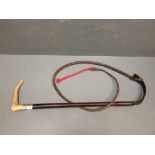 Hunting crop, very unusual with cast metal and enamelled hook, plaited leather covered shaft and