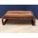 Chinese hardwood opium table with carved frieze on scroll end supports