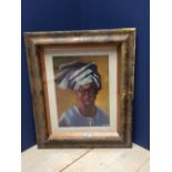 Oil painting portrait of an African woman in traditional dress, signed, 36.5x26cm