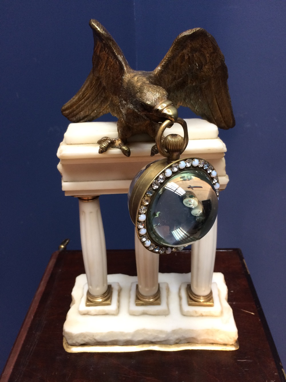 Early C20th white marble & gilt metal watch holder and watch, the dial with subsidiary seconds in