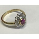 18 ct yellow gold ruby and diamond cluster ring