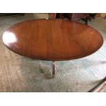 Regency style mahogany oval coffee table