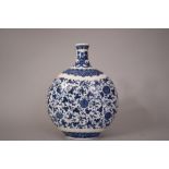 C18th Chinese blue and white moon flask decorated with blossoming branches, 31.6cmH
