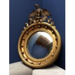 Regency Irish circular bevelled gilt framed mirror with eagle finial