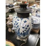 C19th Delft pottery Chinoiserie decorated ovoid table lamp with alternative figural & prunus panel