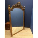 Large C18th style gilt framed over-mantle mirror with reeded side columns under a shallow arched top