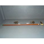 Antler handle walking cane with malacca shaft & silver collar and a pair of mask head bronze