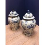 Pair of modern Oriental blue and white vases & covers with Fo Dog finials, 63cmH