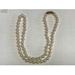 Row of cultured pearls with 18ct yellow gold clasp