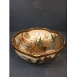 Japanese Satsuma lobed bowl with all over landscape & pagoda decoration, signed with lion, 25cm dia