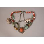 Chinese necklace composed of mixed beads including turquoise and amber.