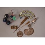 A group of Chinese ornaments comprising a pair of earrings, enamalled beads, hair pins and etc.