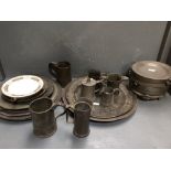 13 various pewter plates (2 crested), largest 46cm dia, 6 pewter plate warmers & 7 various pewter