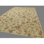 A finely woven Aubusson rug with all over brown and red foliage design on a beige ground 276 x 182