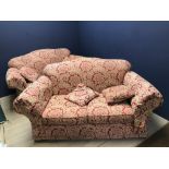 Pair of modern traditional, good quality, two seater sofas with cushions in red & cream floral