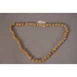 C19th Chinese carved and pierced ivory beads necklace