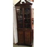 Late C19th, Edwards & Roberts, freestanding two section corner cabinet in the Sheraton revival taste