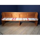 Large pine pew with 3 cushion seats, 230cmL
