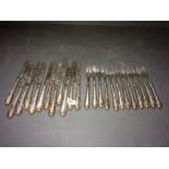 Set of 12 Victorian silver handled dessert spoons, knives & forks by RMEH, Sheffield