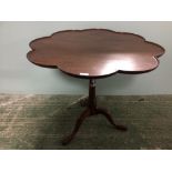 Late George III mahogany tilt tripod table