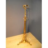 Brass rise and fall standard lamp in the Art Nouveau taste